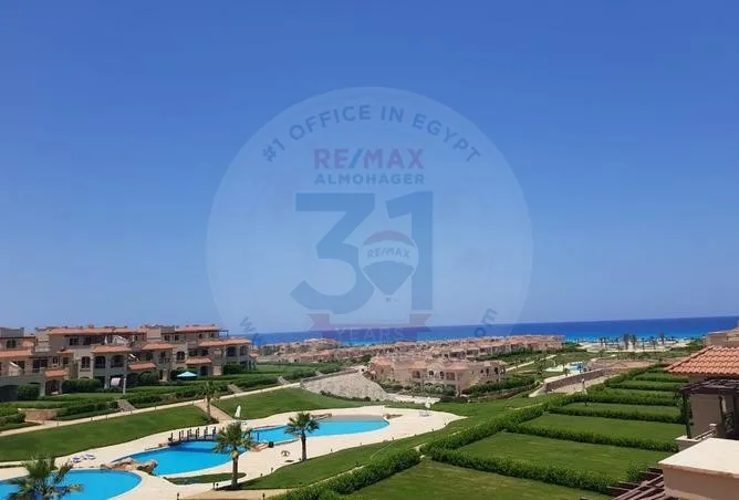 Fully furnished chalet for sale overlooking pool in La Vista Bay