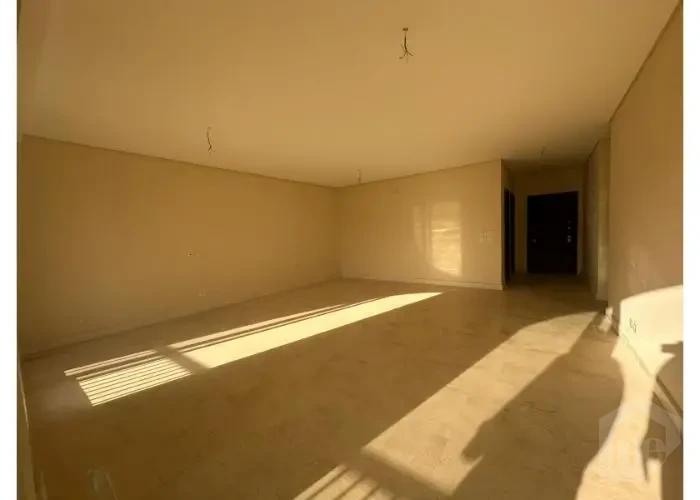 Open interior space in an apartment for sale in 90 Avenue Compound