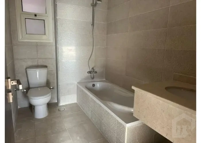 Fully equipped bathroom in 90 Avenue Compound apartment for sale