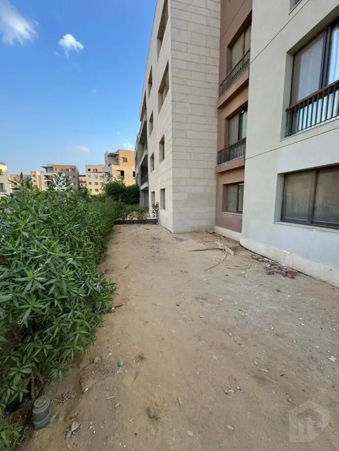 Ground terrace in an apartment for sale in District 5 New Cairo with garden