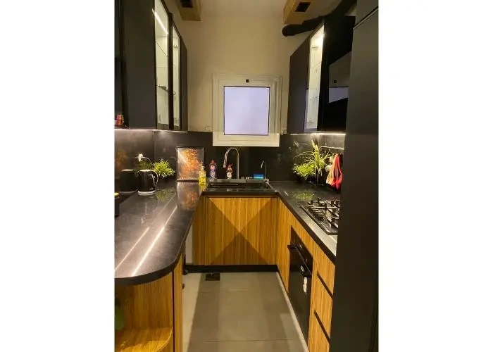 Apartment for sale in Galleria Moon Valley modern wooden kitchen