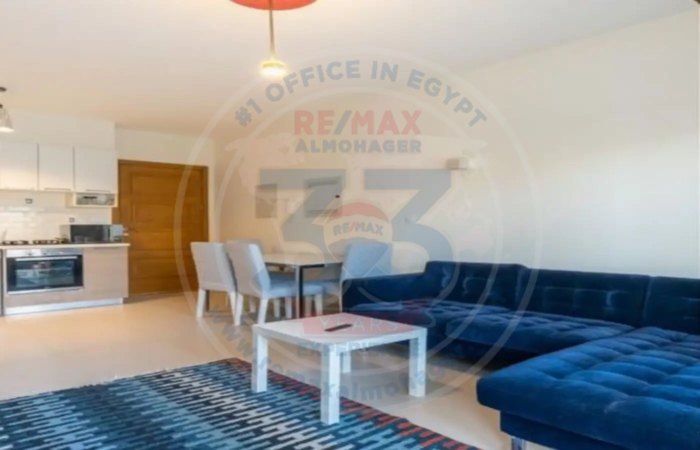 Apartment for sale in Marassi Marina open kitchen with furnished dining area
