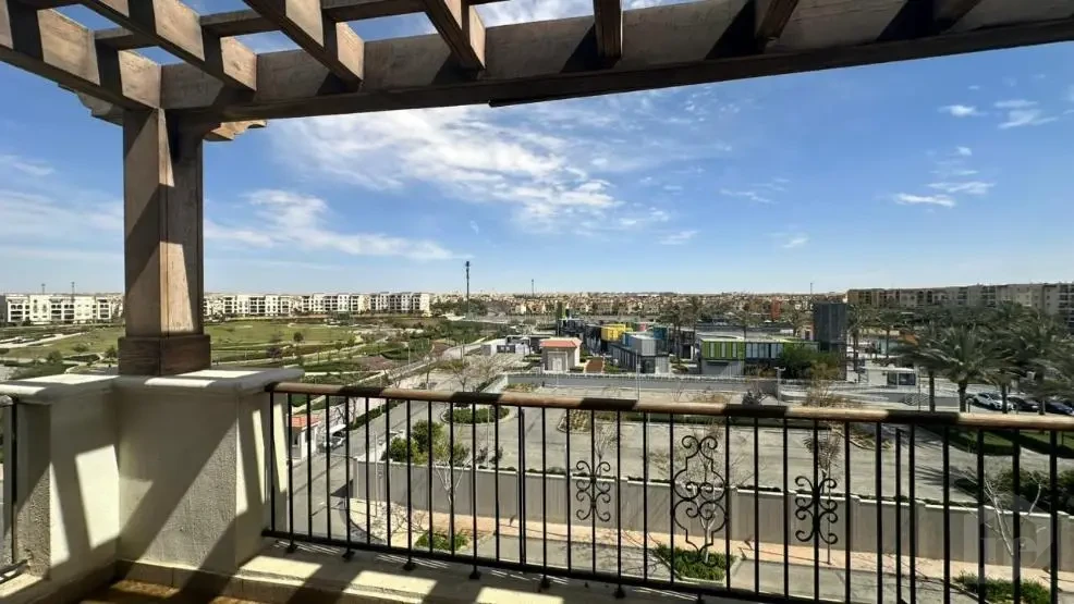 Spacious terrace with an open view in an apartment for sale in Mivida