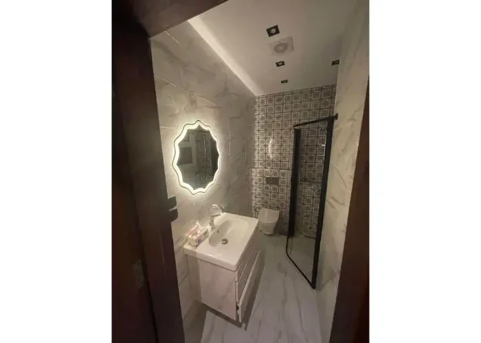 Apartment for sale in Regents New Cairo bathroom with sink and shower
