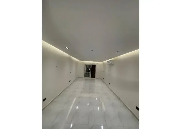 Apartment for sale in Regents New Cairo spacious reception with cove lighting