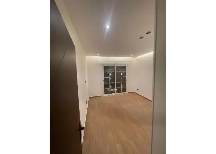 Apartment for sale in Regents New Cairo room with wooden flooring