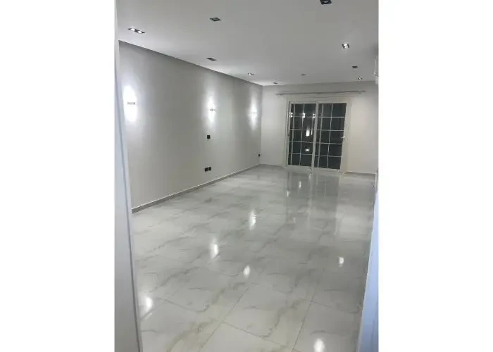 Apartment for sale in Regents New Cairo spacious hall with marble floor