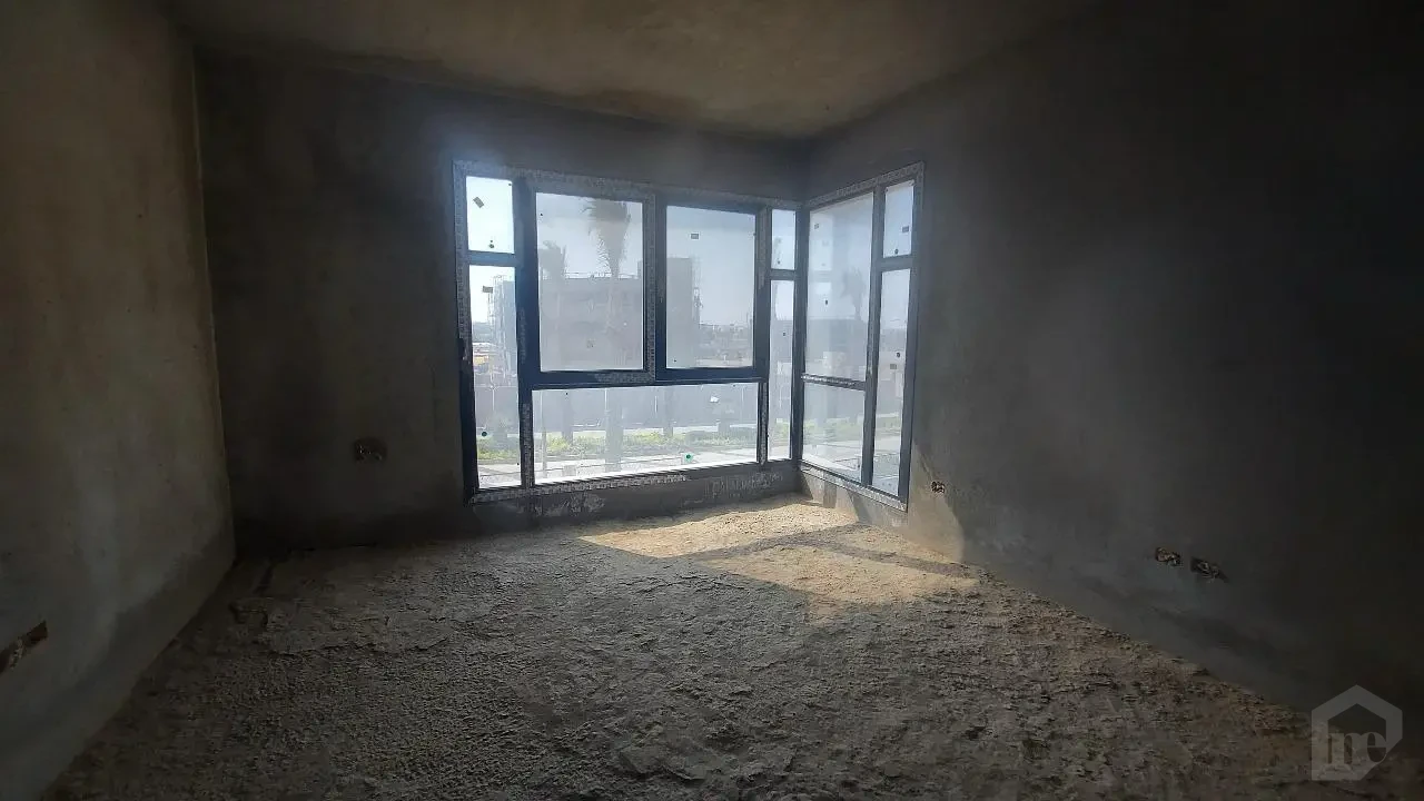 Apartment for sale in Sodic Villette Compound room with glass balcony