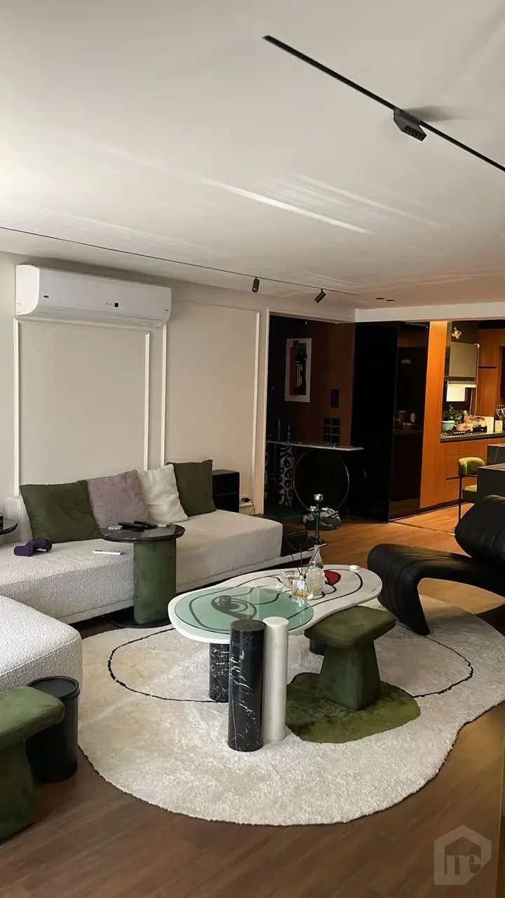Cozy seating area in an apartment for sale in Taj City 145m