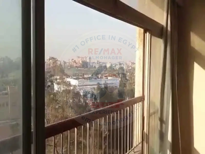 Panoramic window view in Obour Buildings apartment for sale
