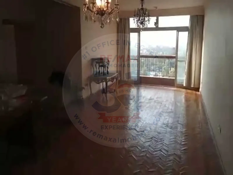 Living room with balcony door in Obour Buildings apartment