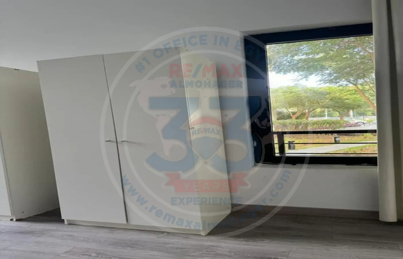 Bedroom overlooking garden in Waterway 1 apartment