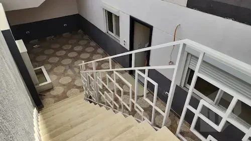 Building staircase view for Lotus Fifth Settlement apartment