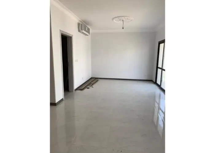 Wide room with balcony door in Sodic East Town apartment