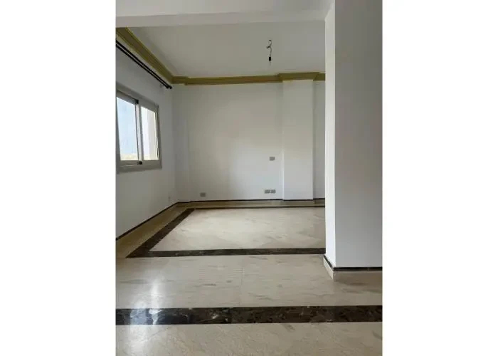 Spacious reception with natural light in an apartment for sale in New Cairo