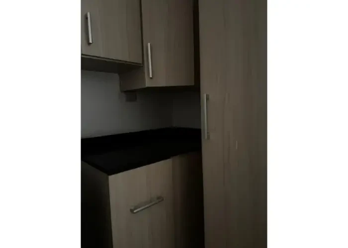 Wooden kitchen design in an apartment for sale in New Cairo compound