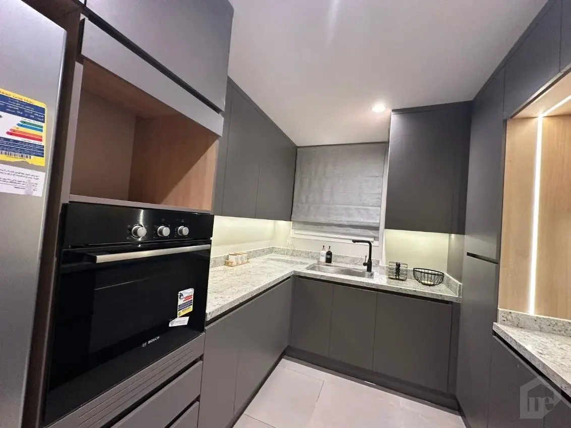 First use furnished apartment for rent in Mivida Boulevard kitchen