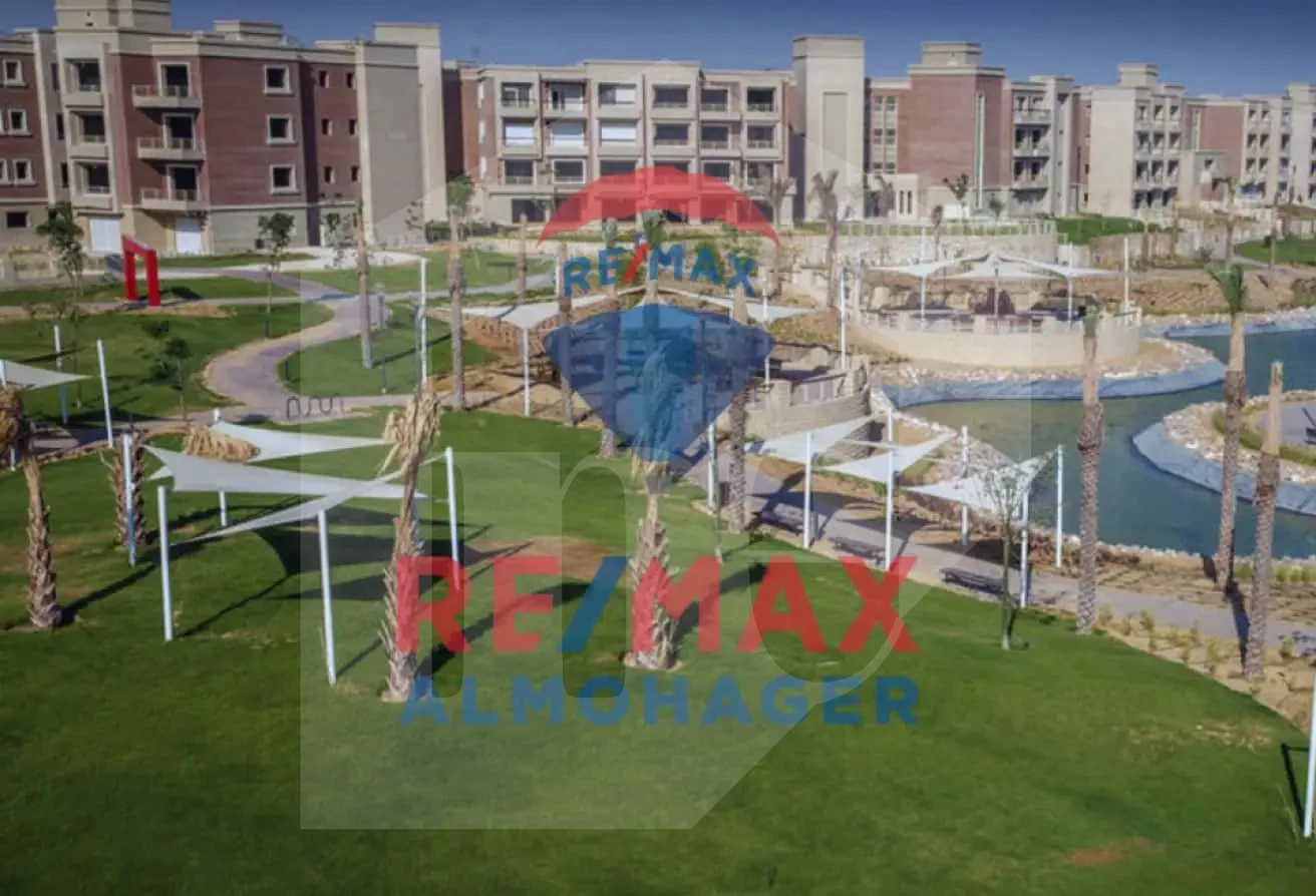 Apartment for sale in New Giza Jasper Wood swimming pool view
