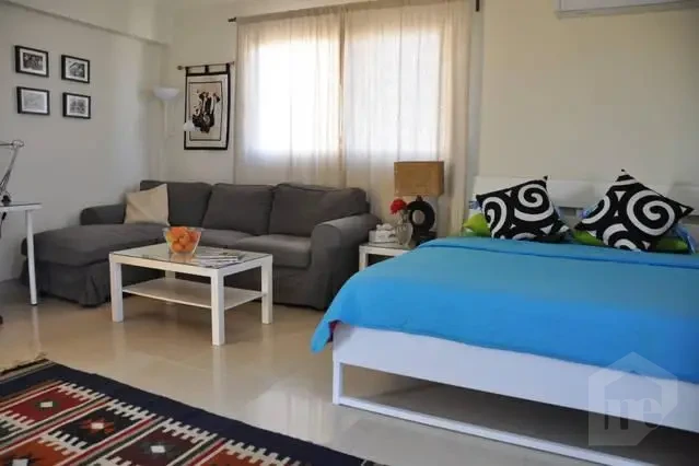 Furnished apartment for rent in New Cairo bedroom with seating