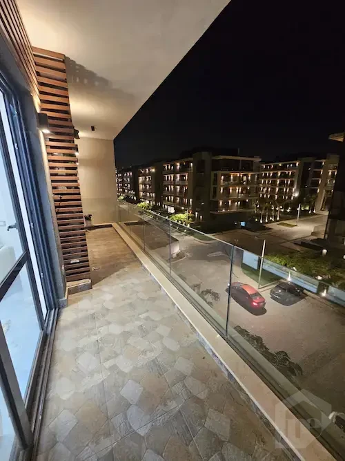 Furnished rental apartment in Patio Oro night balcony view