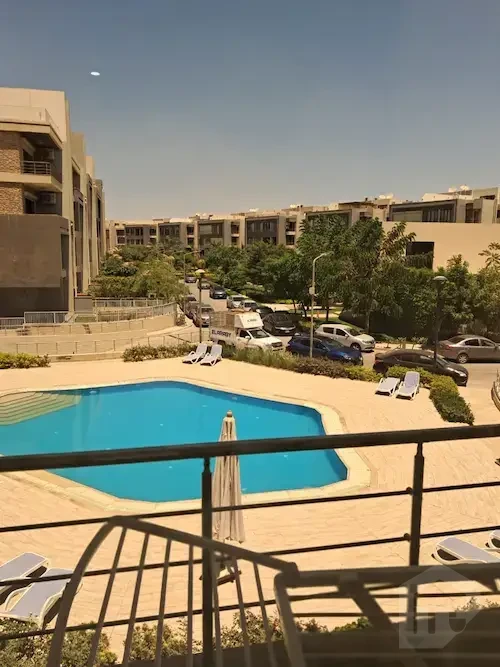 Furnished Apartment with Pool View – Midtown Compound