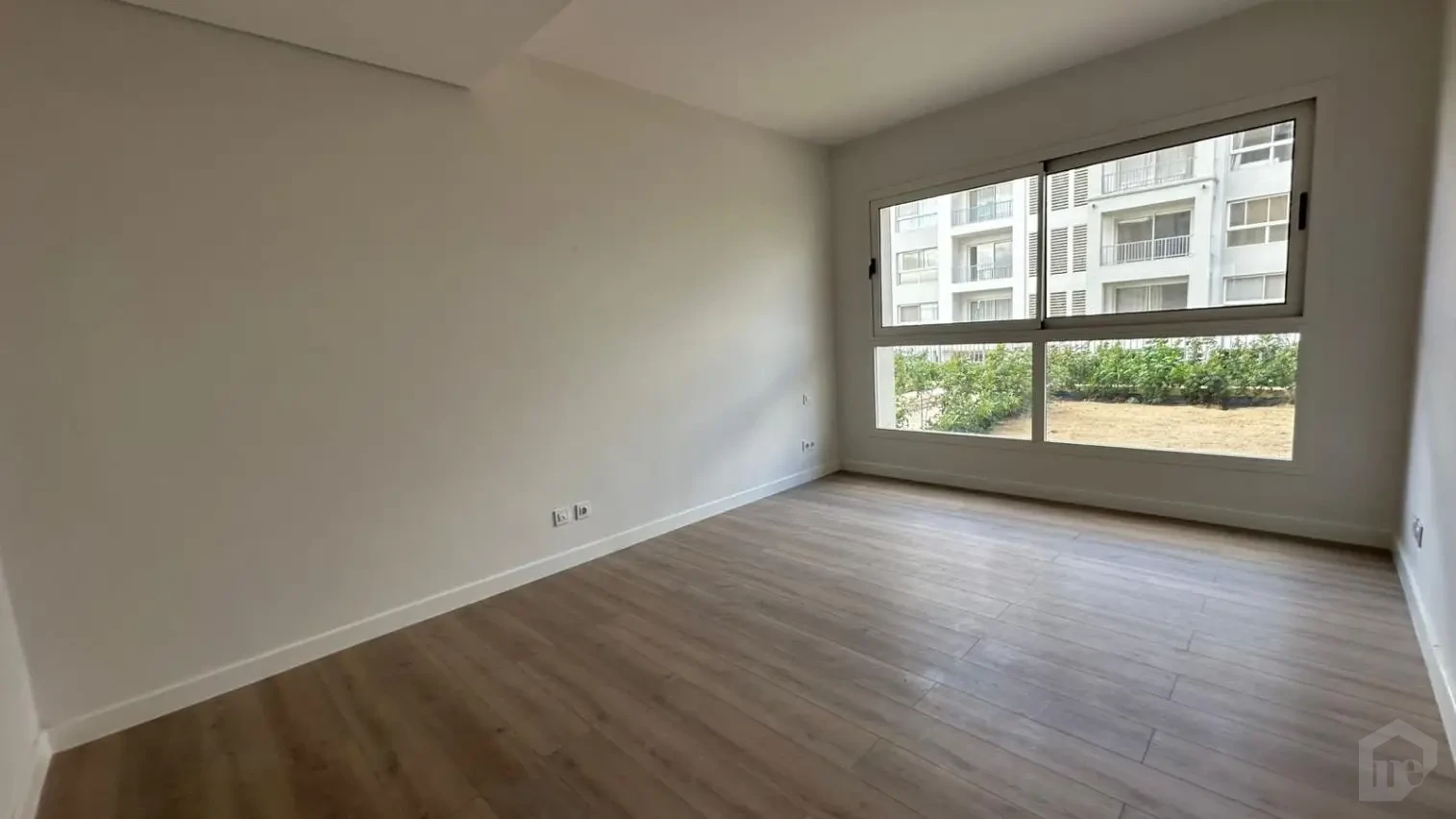Ground floor apartment with garden for rent in Mivida Blue Views bedroom