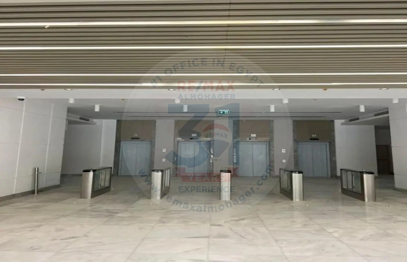 Lobby and elevators of an office for sale in Mivida Business Park