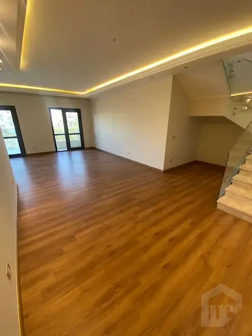 For Rent: Spacious Penthouse in Eastown with Stunning Garden View
