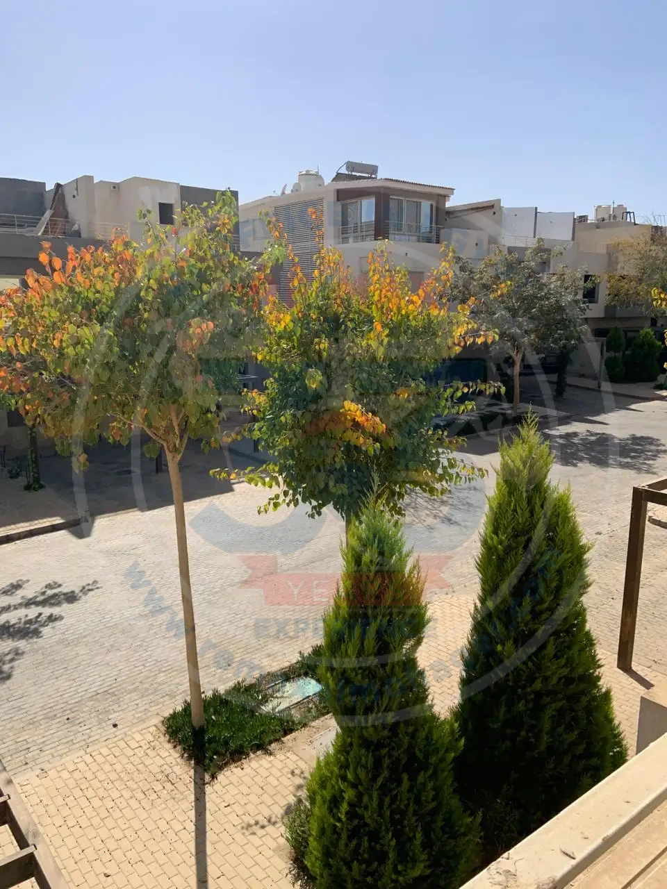 Townhouse for sale in Woodville Palm Hills calm view overlooking walkways and green areas