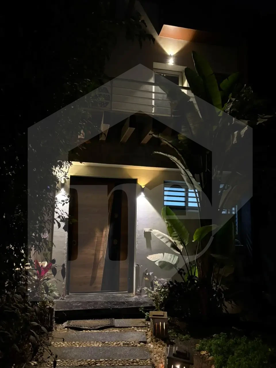 Townhouse for sale in Hyde Park compound elegant entrance with distinctive night lighting