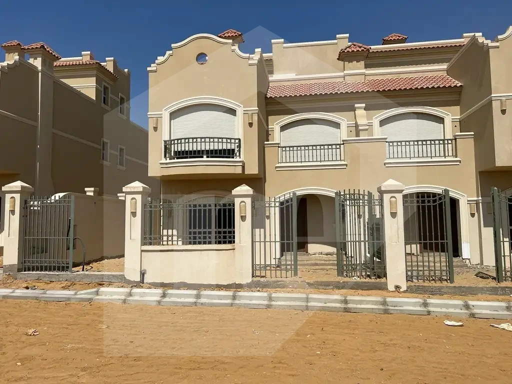Twin house facade for sale in El Patio Oro compound