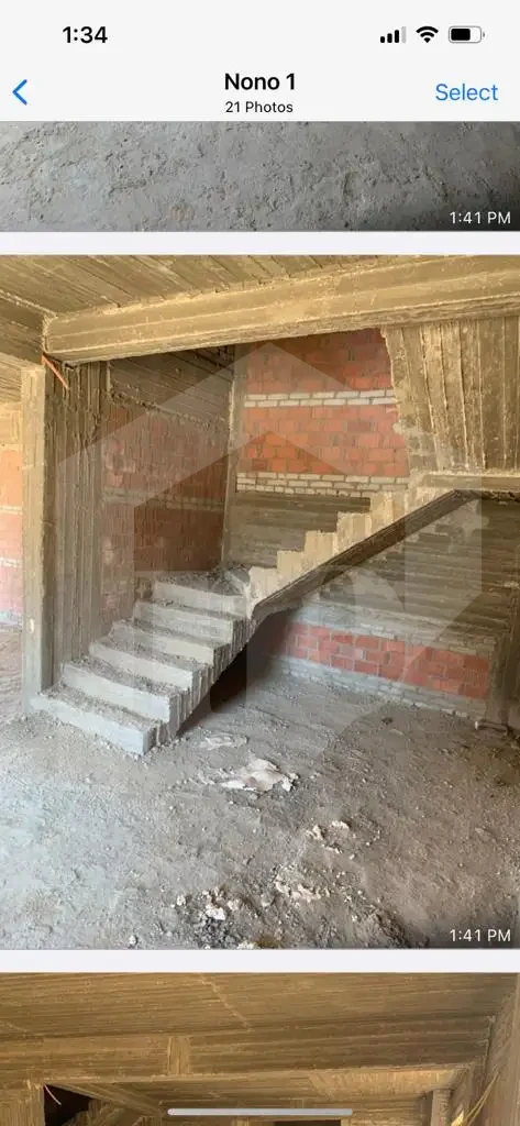 Interior staircase under construction in El Patio Oro twin house