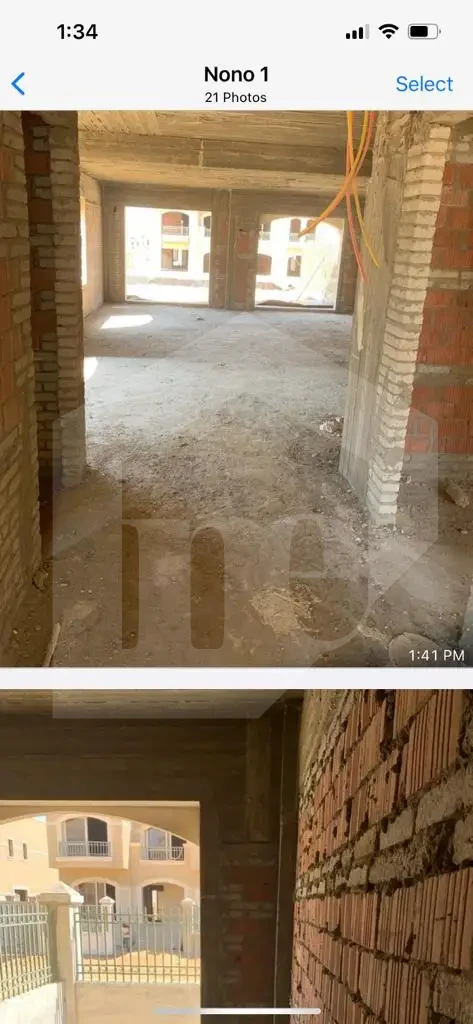 Interior space under construction in El Patio Oro twin house