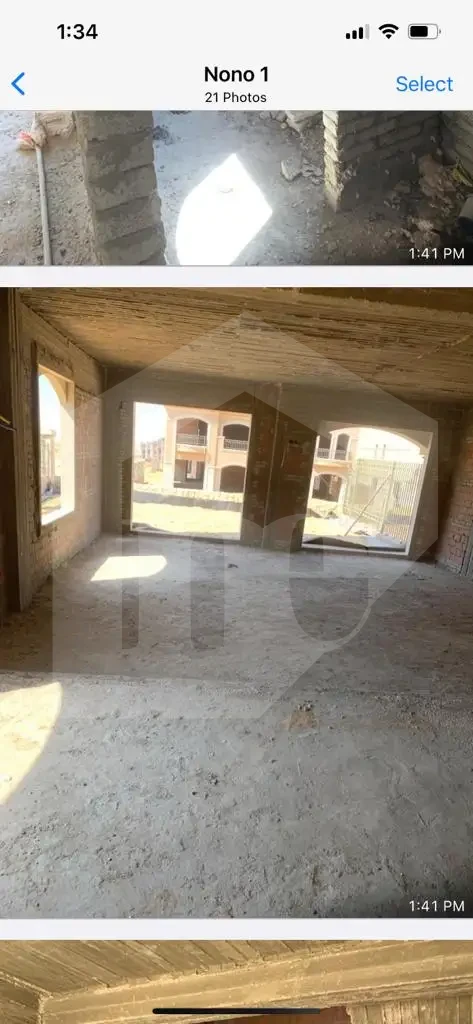 Spacious reception under construction in El Patio Oro twin house