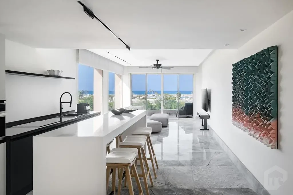 Open kitchen and living area in Hacienda Bay North Coast villa