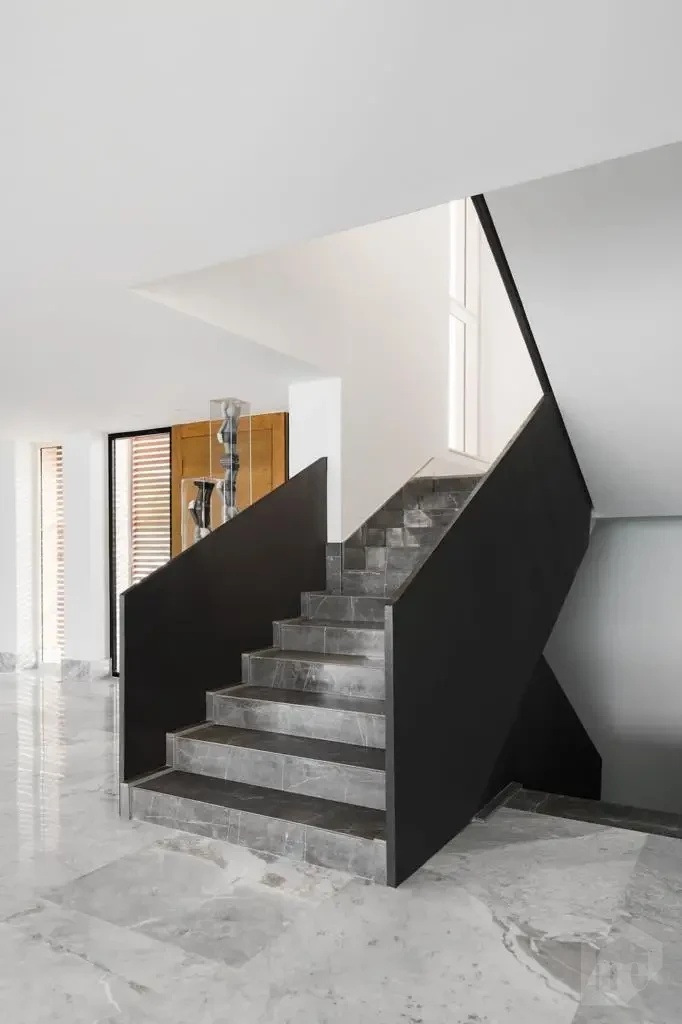 Interior staircase design in Hacienda Bay North Coast villa