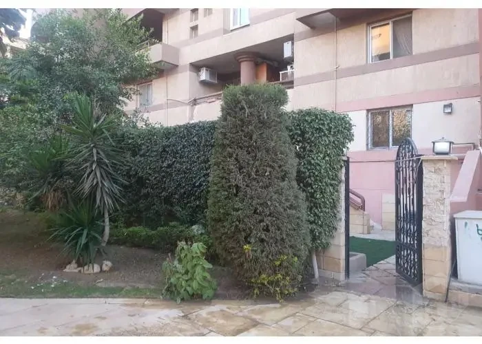 Villa for sale in Al Rehab with side garden and trees